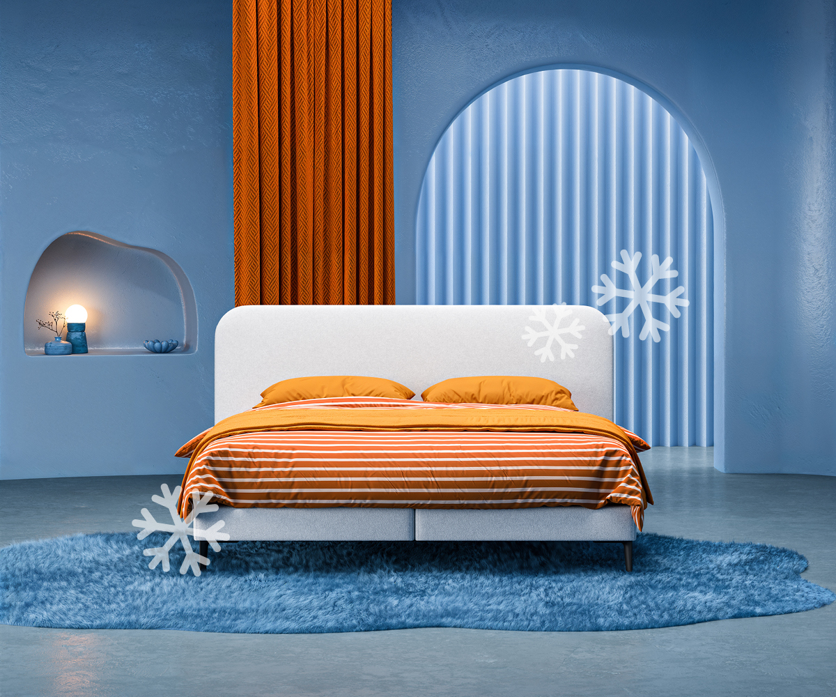 Koele, blauwe slaapkamer met Revor boxspring en verkoelend beddengoed voor een fris slaapklimaat